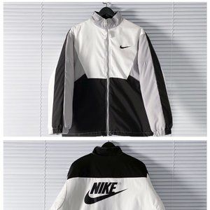 Nike black and white patchwork jacket